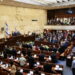 Israeli President-elect Isaac Herzog, Chairman of the Knesset Mickey Levy and outgoing Israeli President Reuven Rivlin attend a a swearing-in ceremony at the Knesset, Israeli parliament, in Jerusalem July 7, 2021. REUTERS/Ronen Zvulun