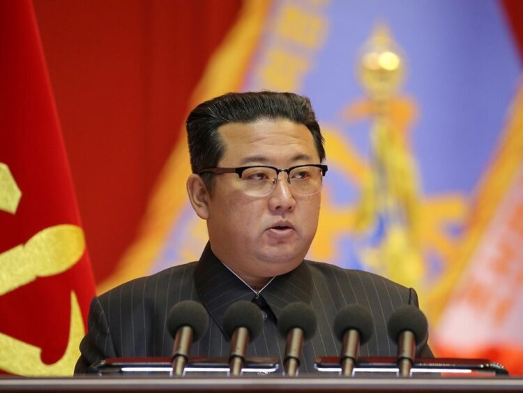 North Korean leader Kim Jong Un speaks during the Eighth Conference of Military Educationists of the Korean People's Army at the April 25 House of Culture in Pyongyang, North Korea in this undated photo released on December 7, 2021. KCNA via REUTERS        ATTENTION EDITORS - THIS IMAGE WAS PROVIDED BY A THIRD PARTY. REUTERS IS UNABLE TO INDEPENDENTLY VERIFY THIS IMAGE. NO THIRD PARTY SALES. SOUTH KOREA OUT. NO COMMERCIAL OR EDITORIAL SALES IN SOUTH KOREA.