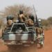 FILE PHOTO: Soldiers from Burkina Faso patrol on the road of Gorgadji in the Sahel area, Burkina Faso March 3, 2019. Picture taken March 3, 2019. REUTERS/Luc Gnago/File Photo/File Photo