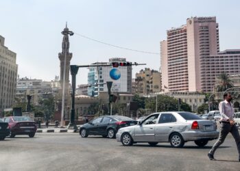 A man crosses the roundabout of the Egyptian capital Cairo's central Tahrir Square on September 21, 2019. - Protests erupted late on September 20 in Cairo and other Egyptian cities calling for the removal of President Abdel Fattah al-Sisi, in a rare show of dissent quickly quashed by authorities. After overnight clashes with the protesters, security forces the following day maintained tight control of Tahrir Square -- the epicentre of the 2011 revolution that unseated long-time autocrat Hosni Mubarak. Protests have been effectively banned in the country under a 2013 law, and a state of emergency is still in full effect. (Photo by Mohamed el-Shahed / AFP)        (Photo credit should read MOHAMED EL-SHAHED/AFP via Getty Images)