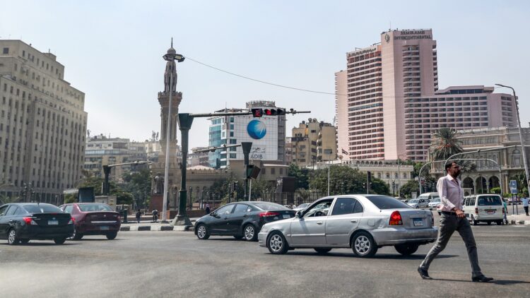 A man crosses the roundabout of the Egyptian capital Cairo's central Tahrir Square on September 21, 2019. - Protests erupted late on September 20 in Cairo and other Egyptian cities calling for the removal of President Abdel Fattah al-Sisi, in a rare show of dissent quickly quashed by authorities. After overnight clashes with the protesters, security forces the following day maintained tight control of Tahrir Square -- the epicentre of the 2011 revolution that unseated long-time autocrat Hosni Mubarak. Protests have been effectively banned in the country under a 2013 law, and a state of emergency is still in full effect. (Photo by Mohamed el-Shahed / AFP)        (Photo credit should read MOHAMED EL-SHAHED/AFP via Getty Images)