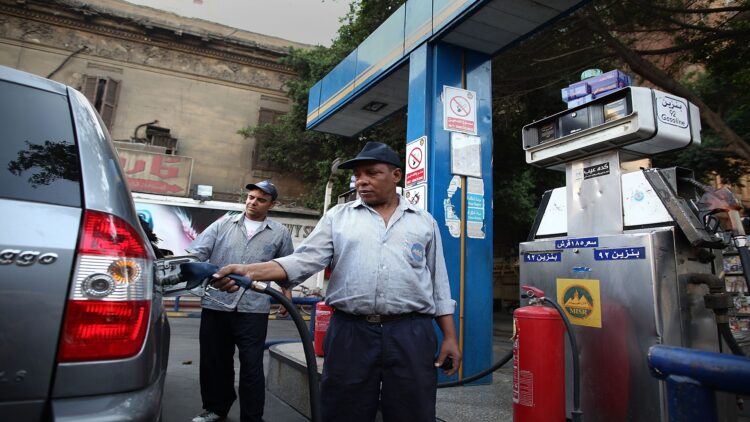 CAIRO, EGYPT - MAY 28: Workers pump fuel at a government owned petrol station on May 28, 2011 in Cairo, Egypt. Protests in January and February brought an end to 30 years of autocratic rule by President Hosni Mubarak who will now face trial. Food prices have doubled and youth unemployment stands at 30%. Tourism is yet to return to pre-uprising levels.  (Photo by Peter Macdiarmid/Getty Images)