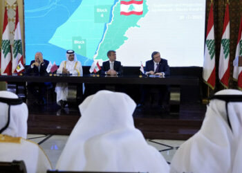 FILE - From left, Claudio Descalzi, the CEO of Italy's state-run energy company, ENI, Qatar's Minister of State for Energy Affairs Saad Sherida al-Kaabi, Lebanese caretaker Energy Minister Walid Fayad and TotalEnergies CEO Patrick Pouyanne, speak to journalists after they sign an agreement in Beirut, Lebanon, Sunday, Jan. 29, 2023. (AP Photo/Bilal Hussein, File)