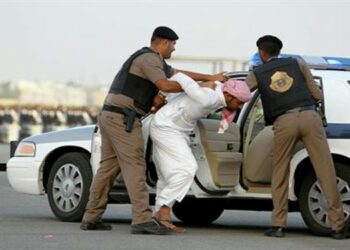 Saudi security forces are arresing a man in this file photo.