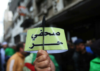 Algerian journalists demonstrate for freedom of the press during a protest against the country's ruling elite and rejecting the December presidential election in Algiers, Algeria November 15, 2019. The armband reads "Free journalist." REUTERS/Ramzi Boudina