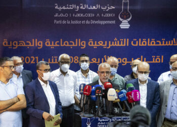 Members of Morocco's Islamist Justice and Development Party (PJD) hold a press conference in the capital Rabat to announce the resignation of its president Saad-Eddine el-Othmani and all members of its general secretariat, after it came in 8th in parliamentary and local elections, on September 9, 2021. - Morocco's long-ruling Islamists have suffered a crushing defeat in parliamentary elections, coming far behind their main liberal rivals, the National Rally of Independents (RNI) and the Authenticity and Modernity Party (PAM) seen as close to the palace, according to provisional results. (Photo by FADEL SENNA / AFP)