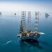 A handout picture provided by Energy giant Saudi Aramco, Saudi Arabia's state-owned oil and gas company, shows its rigs in HSBH field north of Dhahran in the eastern province of Saudi Arabia on March 20, 2018. - Aramco posted on May 12, 2020 a 25 percent slump in first-quarter profit and said the coronavirus crisis which triggered a crash in oil prices would weigh heavily on demand in the year ahead. (Photo by Mohamed ALEBN ALSHAIKH / Saudi Aramco / AFP) / === RESTRICTED TO EDITORIAL USE - MANDATORY CREDIT "AFP PHOTO / HO /ARAMCO" - NO MARKETING NO ADVERTISING CAMPAIGNS - DISTRIBUTED AS A SERVICE TO CLIENTS ===