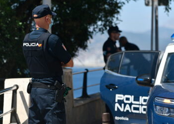 CEUTA, SPAIN - JUNE 28: A national police officer looks on near the beach of the Recinto belonging to the southern bay of Ceuta, on 28 June, 2021 in Ceuta, Spain. A group of agents of the National Police of Ceuta, attached to different units including the UIP, have activated an operation deployed in the area of the Recinto, after receiving the notice of the presence of at least two packages in the sea containing hashish. On arrival they intercepted at least 100 kilos of the drug and arrested several people who were close to the area and who at first appeared to be related to the stash. After determining that they were not related, they have released the detainees and have continued investigating the discovery. (Photo By Antonio Sempere/Europa Press via Getty Images)