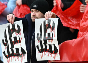 A Sunderland fan taunts Newcastle fans ahead of kick-off in the English FA Cup third round football match between Sunderland and Newcastle United at The Stadium of Light in Sunderland in north east England on January 6, 2024. (Photo by Paul ELLIS / AFP) / RESTRICTED TO EDITORIAL USE. No use with unauthorized audio, video, data, fixture lists, club/league logos or 'live' services. Online in-match use limited to 120 images. An additional 40 images may be used in extra time. No video emulation. Social media in-match use limited to 120 images. An additional 40 images may be used in extra time. No use in betting publications, games or single club/league/player publications. /