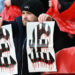 A Sunderland fan taunts Newcastle fans ahead of kick-off in the English FA Cup third round football match between Sunderland and Newcastle United at The Stadium of Light in Sunderland in north east England on January 6, 2024. (Photo by Paul ELLIS / AFP) / RESTRICTED TO EDITORIAL USE. No use with unauthorized audio, video, data, fixture lists, club/league logos or 'live' services. Online in-match use limited to 120 images. An additional 40 images may be used in extra time. No video emulation. Social media in-match use limited to 120 images. An additional 40 images may be used in extra time. No use in betting publications, games or single club/league/player publications. /