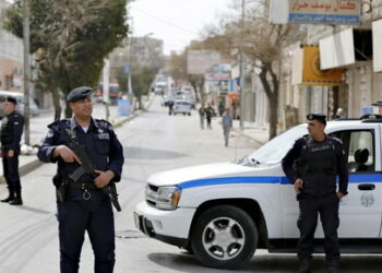 Officers of the Jordanian public security department stand guard in the northern city of Irbid, Jordan, March 2, 2016, where a manhunt conducted by Jordanian security forces resulted in the killing of several Islamist militants.   REUTERS/ Muhammad Hamed