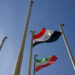 Iraq (top) and Iran flags flutter in the wind during a farewell ceremony for Iraq's Prime Minister Nuri al-Maliki at the International Mehrabad airport in Tehran January 4, 2009. REUTERS/Morteza Nikoubazl (IRAN)