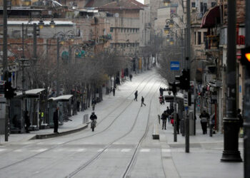 FILE PHOTO: A general view of a usually busy street is seen as Israel tightened a national stay-at-home policy following the spread of coronavirus disease (COVID-19) in Jerusalem March 22, 2020. REUTERS/Ronen Zvulun/File Photo