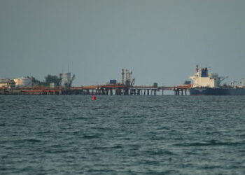 Liberia-flagged Aframax tanker Suvorovsky Prospect discharges fuel oil from Russia at the Matanzas terminal, in Matanzas, Cuba, July 16, 2022. REUTERS/Alexandre Meneghini