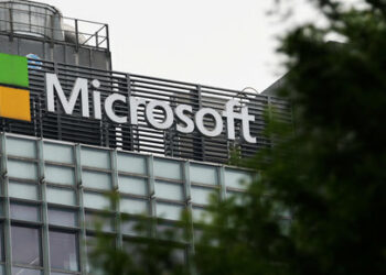 Logo of Microsoft is pictured on its office building in Beijing, China May 25, 2023. REUTERS/Tingshu Wang