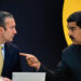 Venezuela's President Nicolas Maduro (R) speaks with Vice-President Tarek El Aissami during a press conference to launch to the market a new oil-backed cryptocurrency called "Petro", at the Miraflores Presidential Palace in Caracas, on February 20, 2018. - Venezuela formally launched its new oil-backed cryptocurrency on Tuesday in an unconventional bid to haul itself out of a deepening economic crisis. The leftist Caracas government put 38.4 million units of the world's first state-backed digital currency, the Petro, on private pre-sale from the early hours. A total of 100 million Petros will go on sale, with an initial value set at $60, based on the price of a barrel of Venezuelan crude in mid-January. (Photo by FEDERICO PARRA / AFP)