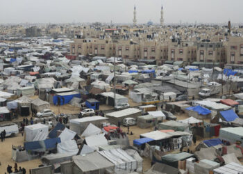 A tent camp housing Palestinians displaced by the Israeli offensive is seen in Rafah, Gaza Strip, Tuesday, Feb. 27, 2024. (AP Photo/Hatem Ali)