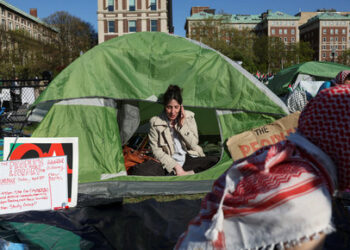 A tent set up as a library is seen as students continue to maintain a protest encampment in support of Palestinians at Columbia University, during the ongoing conflict between Israel and the Palestinian Islamist group Hamas, in New York City, U.S., April 26, 2024. REUTERS/Caitlin Ochs