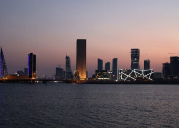 A picture shows a view of the skyline of Manama on February 28, 2023. (Photo by Giuseppe CACACE / AFP)