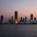 A picture shows a view of the skyline of Manama on February 28, 2023. (Photo by Giuseppe CACACE / AFP)