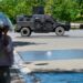 A police vehicle monitors the area near the National Palace in Port-au-Prince, Haiti, on April 2, 2024. More than 50,000 people fled Port-au-Prince within three weeks last month as an explosion of gang violence shook the Haitian capital, the United Nations said April 2, 2024. (Photo by Clarens SIFFROY / AFP)