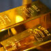 FILE PHOTO: Gold bar replicas are displayed at the Prospectors and Developers Association of Canada (PDAC) annual conference in Toronto, Ontario, Canada March 7, 2023. REUTERS/Chris Helgren/File Photo