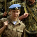 Guardsmen from Russia's elite 76th Airborne Division, which is moving
from a largely conscript to fully professional force, escort a rare
female paratrooper carrying soldiers' wages, September 6, 2002 in
Pskov. While conscripts in the division earn around 100 roubles a
month, pay for soldiers who join as professionals starts at around
3,000 roubles ($95 U.S. dollars). TO ACCOMPANY THE FEATURE STORY
BC-RUSSIA-MILITARY-REFORM REUTERS/Viktor Korotayev

AS/WS