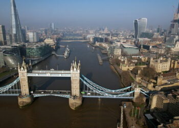 A general view of London showing Tower Bridge, The Shard, London City Hall, The Fenchurch Building, also known as The Walkie Talkie, The Tower Of London, St. Paul's Cathedral, in London, Britain, March 23, 2022.  Picture taken with a drone.     REUTERS/Yann Tessier