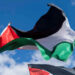 FILE PHOTO: Palestinian flags fly over a rally held by American Muslims for Palestine calling for a cease fire in Gaza near the Washington Monument in Washington, U.S., October 21, 2023.  REUTERS/Bonnie Cash/File Photo