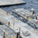 U.S. Army Soldiers assigned to the 7th Transportation Brigade (Expeditionary) and U.S. Navy sailors attached to the MV Roy P. Benavidez assemble the Roll-On, Roll-Off Distribution Facility (RRDF), or floating pier, to assist in the delivery of humanitarian aid to the people of Gaza, in the Mediterranean Sea April 26, 2024.   U.S. Army Central/Handout via REUTERS.  THIS IMAGE HAS BEEN SUPPLIED BY A THIRD PARTY