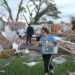 Volunteers clean up after a tornado touched down in Nevada, Iowa, U.S. May 21, 2024. Nirmalendu Majumdar/Ames Tribune/USA Today Network via REUTERS.   NO RESALES. NO ARCHIVES. MANDATORY CREDIT