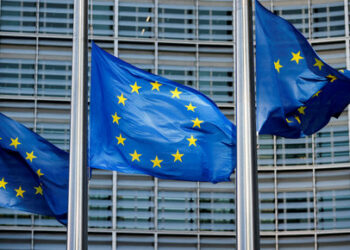 FILE PHOTO: European Union flags fly outside the European Commission headquarters in Brussels, Belgium, March 1, 2023.REUTERS/Johanna Geron/File Photo