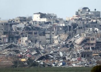A picture taken from southern Israel near the border with the Gaza Strip on December 21, 2023, shows destruction in northern Gaza resulting from weeks of Israeli bombardment of the Palestinian territory amid ongoing battles with the Hamas militant group. (Photo by JACK GUEZ / AFP)