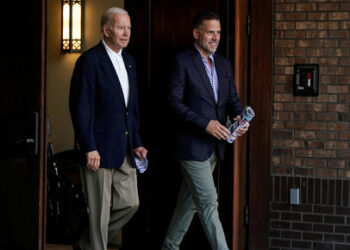 FILE PHOTO: U.S. President Joe Biden and his son Hunter Biden depart from Holy Spirit Catholic Church after attending Mass on St. Johns Island, South Carolina, U.S., August 13, 2022.      REUTERS/Joshua Roberts/File Photo