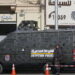 People walk next to an Egyptian riot police vehicle guarding at Tahrir Square, ahead of the anniversary of the 2011 Egyptian revolution, in Cairo, Egypt January 17, 2023. REUTERS/Amr Abdallah Dalsh