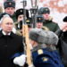 Russia's President Vladimir Putin and Defence Minister Sergei Shoigu watch honour guards passing by after a wreath laying ceremony marking Defender of the Fatherland Day at the Tomb of the Unknown Soldier by the Kremlin Wall in Moscow, Russia, February 23, 2024. Sputnik/Sergei Savostyanov/Pool via REUTERS ATTENTION EDITORS - THIS IMAGE WAS PROVIDED BY A THIRD PARTY.