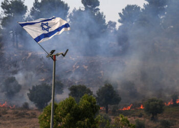A view of bushes burning following over border rockets launching to Israel from Lebanon, amid ongoing cross-border hostilities between Hezbollah and Israeli forces, in northern Israel June 12, 2024. REUTERS/Ayal Margolin. ISRAEL OUT. NO COMMERCIAL OR EDITORIAL SALES IN ISRAEL