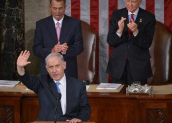 (FILES) Israel's Prime Minister Benjamin Netanyahu waves following his address to a joint session of the US Congress on March 3, 2015 at the US Capitol in Washington, DC. - Democratic and Republican leaders in the US Congress have invited Israeli Prime Minister Benjamin Netanyahu to deliver an address within weeks to lawmakers, House Speaker Mike Johnson said on May 31, 2024. (Photo by Mandel NGAN / AFP)