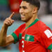 Soccer Football - FIFA World Cup Qatar 2022 - Round of 16 - Morocco v Spain - Education City Stadium, Al Rayyan, Qatar - December 6, 2022 Morocco's Achraf Hakimi celebrates after scoring the winning penalty during the penalty shootout as Morocco progress to the quarter finals REUTERS/Matthew Childs