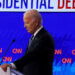 FILE PHOTO: Democrat presidential candidate U.S. President Joe Biden listens as Republican presidential candidate former U.S. President Donald Trump speaks during their debate in Atlanta, Georgia, U.S., June 27, 2024. REUTERS/Brian Snyder/File Photo