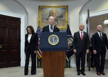 President Joe Biden arrives to speak from the Roosevelt Room of the White House in Washington, Sunday, July 14, 2024, about the apparent assassination attempt of former President Donald Trump at a campaign rally in Pennsylvania. Joining him are Vice President Kamala Harris, Attorney General Merrick Garland and Homeland Security Secretary Alejandro Mayorkas. (AP Photo/Susan Walsh)