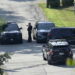 Law enforcement block a street in Bethel Park, Pa., that they say had a residence of Thomas Matthew Crooks, the suspected shooter of former President Donald Trump, Sunday, July 14, 2024. (AP Photo/Joshua A. Bickel)