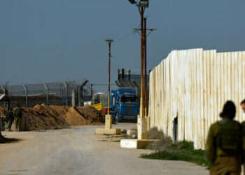 An aid truck enters from Egypt en route to Gaza, amid the ongoing conflict between Israel and the Palestinian Islamist group Hamas, as seen from the Kerem Shalom crossing, in Israel, December 22, 2023. REUTERS/Clodagh Kilcoyne