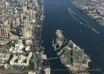 A view from an airplane window shows buildings around the Nile River in Cairo, Egypt, May 2, 2023. REUTERS/Mohamed Abd El Ghany