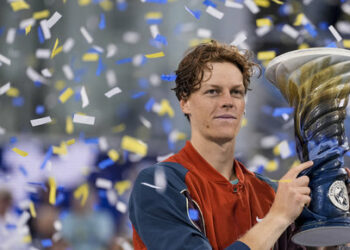 Aug 19 2024; Cincinnati, OH, USA; Jannik Sinner of Italy accepts the Rookwood Cup championship trophy after defeating Frances Tiafoe of the United States in the men’s singles final on day seven of the Cincinnati Open. Mandatory Credit: Sam Greene-The Cincinnati Enquirer/USA TODAY Sports