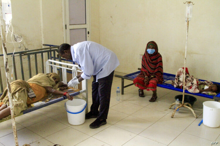 Patients suffering from cholera receive treatment at a rural isolation centre in Wad Al-Hilu in Kassala state in eastern Sudan, on August 17, 2024. - Sudan's health minister on August 17 declared a cholera epidemic after weeks of heavy rain in the war-torn country, in a video released by his ministry. The northeast African country has been engulfed in a war since April 2023 between the Sudanese army under the country's de facto ruler Abdel Fattah al-Burhan and the paramilitary Rapid Support Forces (RSF), led by his former deputy Mohamed Hamdan Daglo. (Photo by AFP)