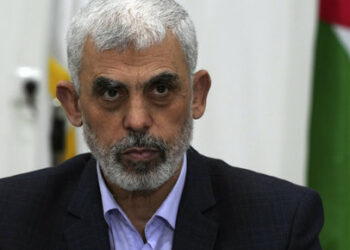 Yahya Sinwar, head of Hamas in Gaza, chairs a meeting with leaders of Palestinian factions at his office in Gaza City, Wednesday, April 13, 2022. (AP Photo/Adel Hana)