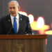 Israeli Prime Minister Benjamin Netanyahu speaks at a memorial ceremony for those murdered by Hamas on October 7, 2023, and those who fell in the "Iron Sword" war, at the Knesset, the Parliament, in Jerusalem, on Monday, October 28, 2024. DEBBIE HILL/Pool via REUTERS