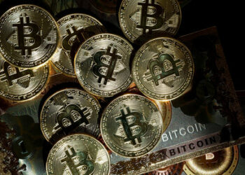 FILE PHOTO: Representations of cryptocurrency Bitcoin are seen in this illustration picture taken in Paris, France, March 9, 2024. REUTERS/Benoit Tessier/Illustration/File Photo