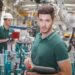 technician team while robot maintenance in a welding shop of a car manufacture